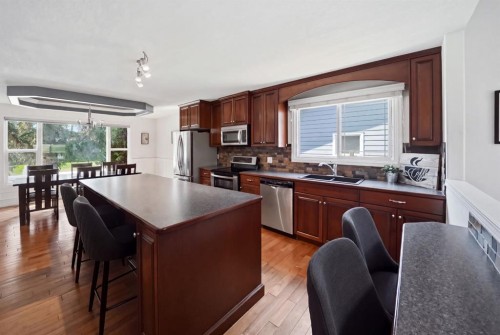 57 Page Avenue, Red Deer, AB - Indoor Photo Showing Kitchen With Stainless Steel Kitchen With Double Sink