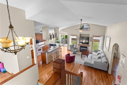 5408 59 Street, Camrose, AB - Indoor Photo Showing Living Room With Fireplace