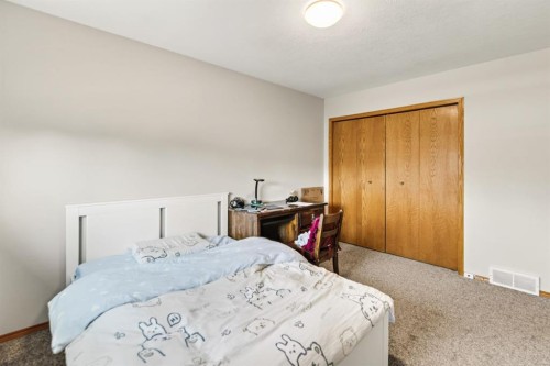 78 Duston Street, Red Deer, AB - Indoor Photo Showing Bedroom