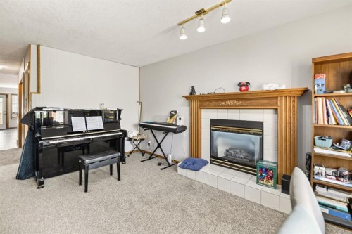 78 Duston Street, Red Deer, AB - Indoor With Fireplace