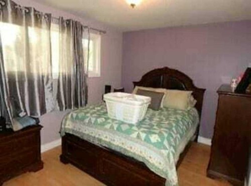 4817 40 Street, Lloydminster, SK - Indoor Photo Showing Bedroom