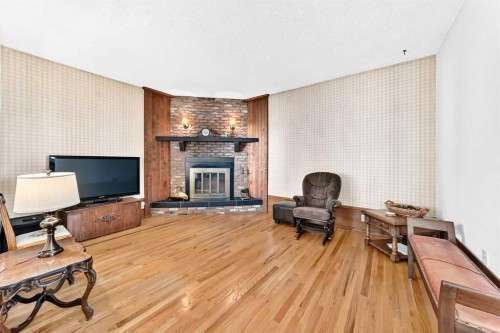 3 43 Avenue Close, Lacombe, AB - Indoor With Fireplace