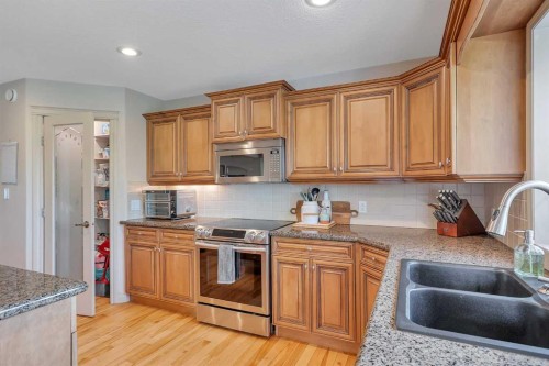 57 Archer Drive, Red Deer, AB - Indoor Photo Showing Kitchen With Double Sink With Upgraded Kitchen