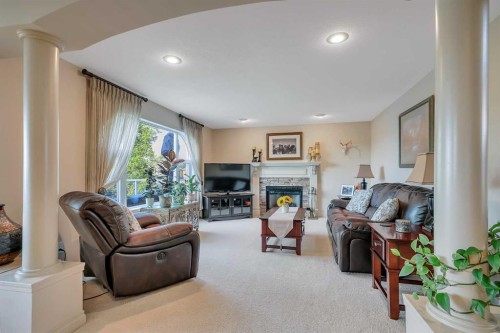 57 Archer Drive, Red Deer, AB - Indoor Photo Showing Living Room With Fireplace