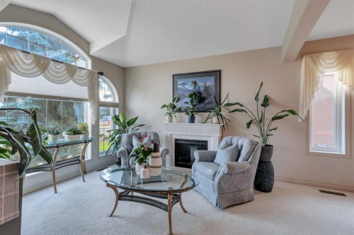 57 Archer Drive, Red Deer, AB - Indoor Photo Showing Living Room With Fireplace