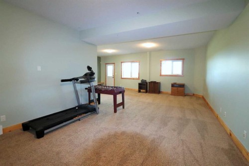425062 Range Road 250, Rural Ponoka County, AB - Indoor Photo Showing Gym Room