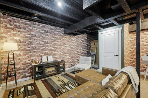 21 Regatta Way, Sylvan Lake, AB - Indoor With Fireplace