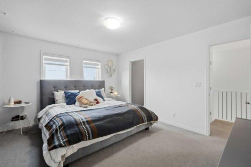 21 Regatta Way, Sylvan Lake, AB - Indoor Photo Showing Bedroom