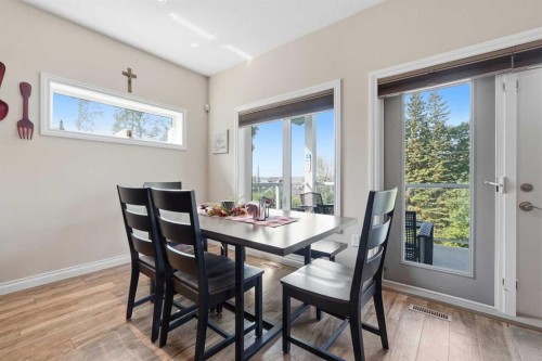 707 Elk Street, Sunbreaker Cove, AB - Indoor Photo Showing Dining Room