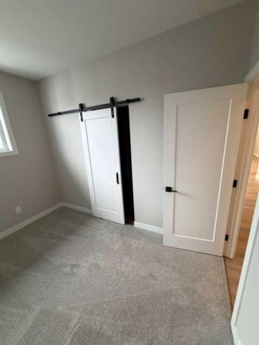 85 Gray Close, Sylvan Lake, AB - Indoor Photo Showing Other Room