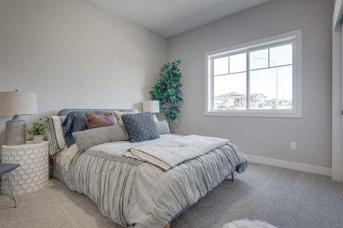 83 Gray Close, Sylvan Lake, AB - Indoor Photo Showing Bedroom