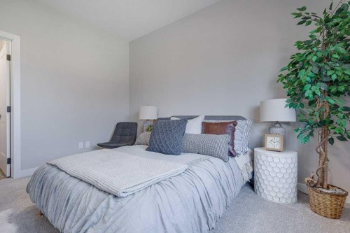 83 Gray Close, Sylvan Lake, AB - Indoor Photo Showing Bedroom