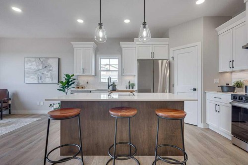 83 Gray Close, Sylvan Lake, AB - Indoor Photo Showing Kitchen With Stainless Steel Kitchen With Upgraded Kitchen