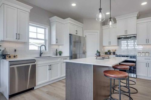 83 Gray Close, Sylvan Lake, AB - Indoor Photo Showing Kitchen With Stainless Steel Kitchen With Upgraded Kitchen
