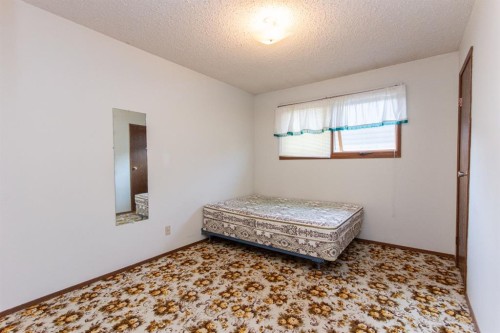 1910 26 Avenue, Delburne, AB - Indoor Photo Showing Bedroom