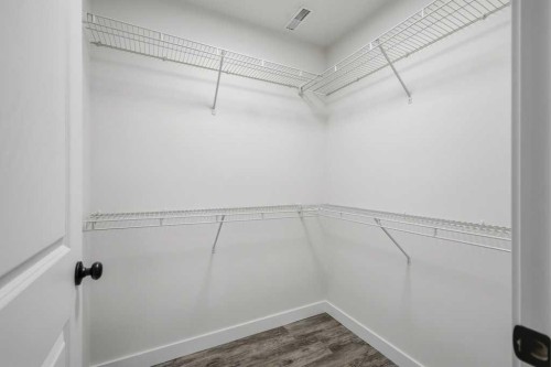 93 Valley Crescent, Blackfalds, AB - Indoor With Storage