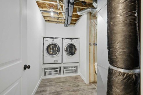 93 Valley Crescent, Blackfalds, AB - Indoor Photo Showing Laundry Room