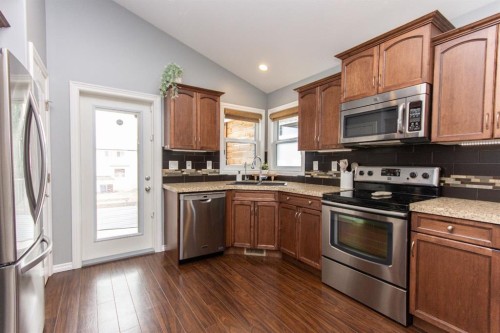 52 Almond Crescent, Blackfalds, AB - Indoor Photo Showing Kitchen With Stainless Steel Kitchen