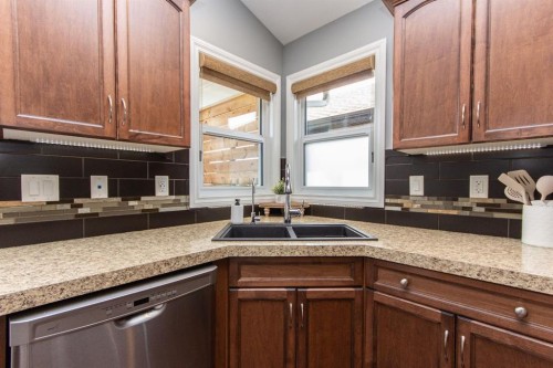 52 Almond Crescent, Blackfalds, AB - Indoor Photo Showing Kitchen With Double Sink