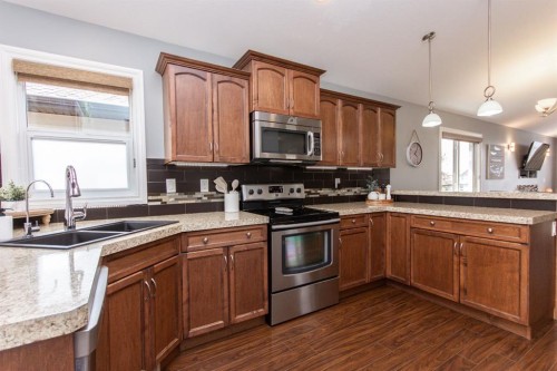 52 Almond Crescent, Blackfalds, AB - Indoor Photo Showing Kitchen With Double Sink