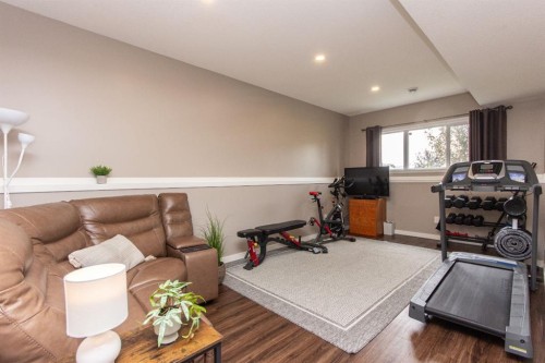 52 Almond Crescent, Blackfalds, AB - Indoor Photo Showing Gym Room
