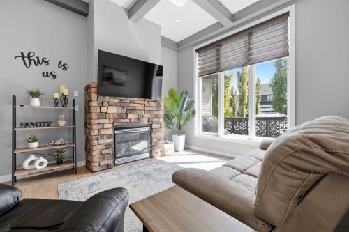 362 Webster Drive, Red Deer, AB - Indoor Photo Showing Living Room With Fireplace