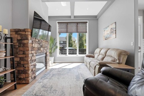 362 Webster Drive, Red Deer, AB - Indoor Photo Showing Living Room With Fireplace