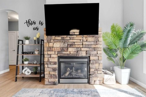 362 Webster Drive, Red Deer, AB - Indoor Photo Showing Living Room With Fireplace