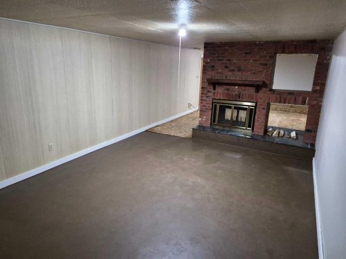 68 Hermary, Red Deer, AB - Indoor With Fireplace
