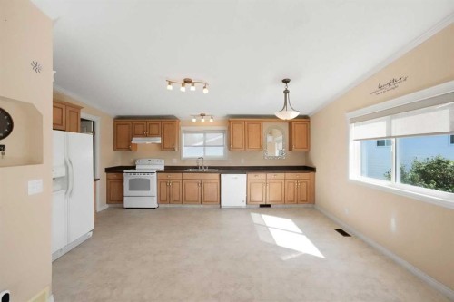 4591 Eastview Crescent, Rimbey, AB - Indoor Photo Showing Kitchen With Double Sink
