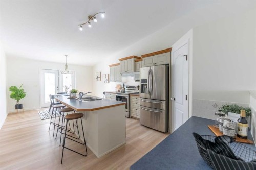73 Ogilvie Close, Red Deer, AB - Indoor Photo Showing Kitchen With Double Sink