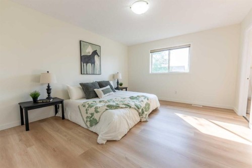 73 Ogilvie Close, Red Deer, AB - Indoor Photo Showing Bedroom