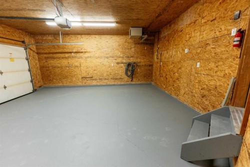 73 Ogilvie Close, Red Deer, AB - Indoor Photo Showing Garage