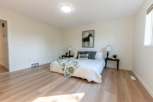 73 Ogilvie Close, Red Deer, AB - Indoor Photo Showing Bedroom