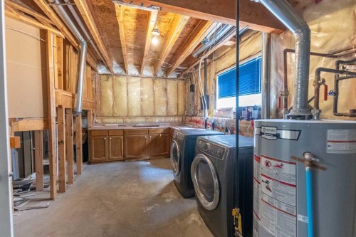 73 Ogilvie Close, Red Deer, AB - Indoor Photo Showing Laundry Room
