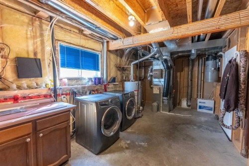 73 Ogilvie Close, Red Deer, AB - Indoor Photo Showing Laundry Room