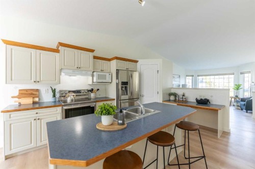 73 Ogilvie Close, Red Deer, AB - Indoor Photo Showing Kitchen With Double Sink