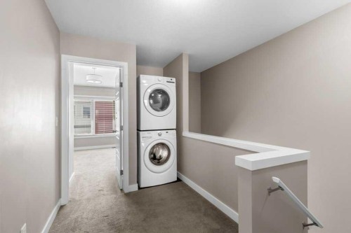702-125 Caribou Crescent, Red Deer, AB - Indoor Photo Showing Laundry Room