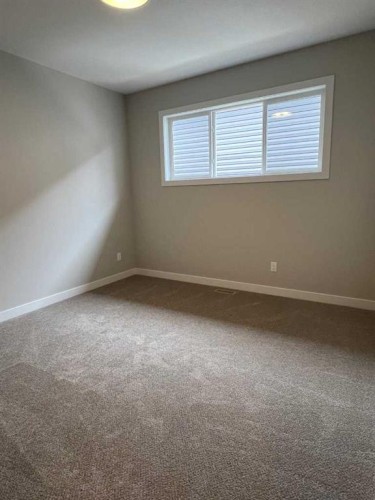 7 Gray Close, Sylvan Lake, AB - Indoor Photo Showing Other Room