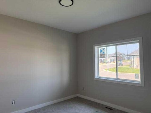 7 Gray Close, Sylvan Lake, AB - Indoor Photo Showing Other Room