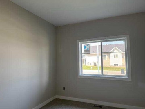 7 Gray Close, Sylvan Lake, AB - Indoor Photo Showing Other Room
