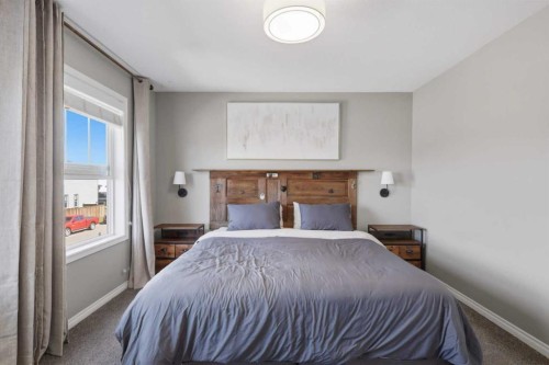 9 Hampton Crescent, Sylvan Lake, AB - Indoor Photo Showing Bedroom
