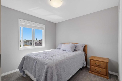 9 Hampton Crescent, Sylvan Lake, AB - Indoor Photo Showing Bedroom