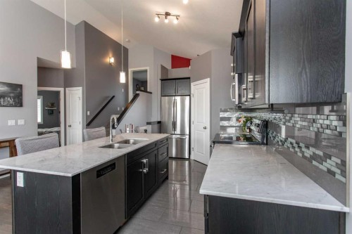 51 Emily Crescent, Lacombe, AB - Indoor Photo Showing Kitchen With Stainless Steel Kitchen With Double Sink With Upgraded Kitchen