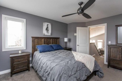 51 Emily Crescent, Lacombe, AB - Indoor Photo Showing Bedroom