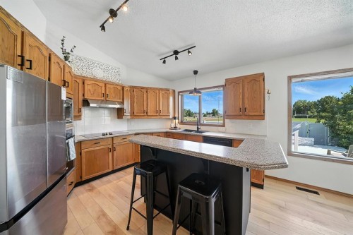 14 Denison Crescent, Red Deer, AB - Indoor Photo Showing Kitchen With Double Sink