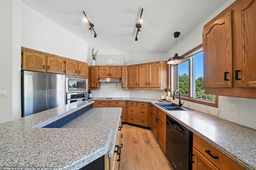 14 Denison Crescent, Red Deer, AB - Indoor Photo Showing Kitchen With Double Sink