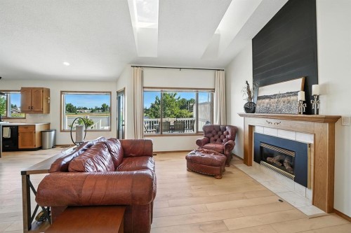14 Denison Crescent, Red Deer, AB - Indoor Photo Showing Living Room With Fireplace