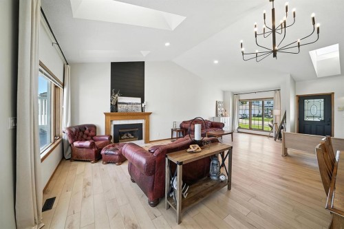 14 Denison Crescent, Red Deer, AB - Indoor Photo Showing Living Room With Fireplace