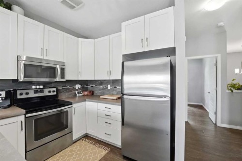 161 Crimson Court, Blackfalds, AB - Indoor Photo Showing Kitchen With Stainless Steel Kitchen With Upgraded Kitchen